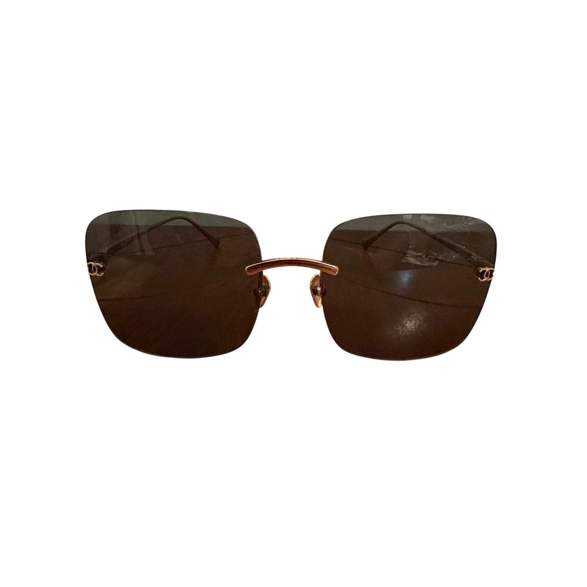 $900 | Chanel CH4287T square titanium sunglasses
Light gold / silver titanium · gray lenses